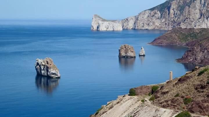 L'Estasi Tanca Piras A Bordo Piscina Con Vista Mare Villa Nebida Dış mekan fotoğraf